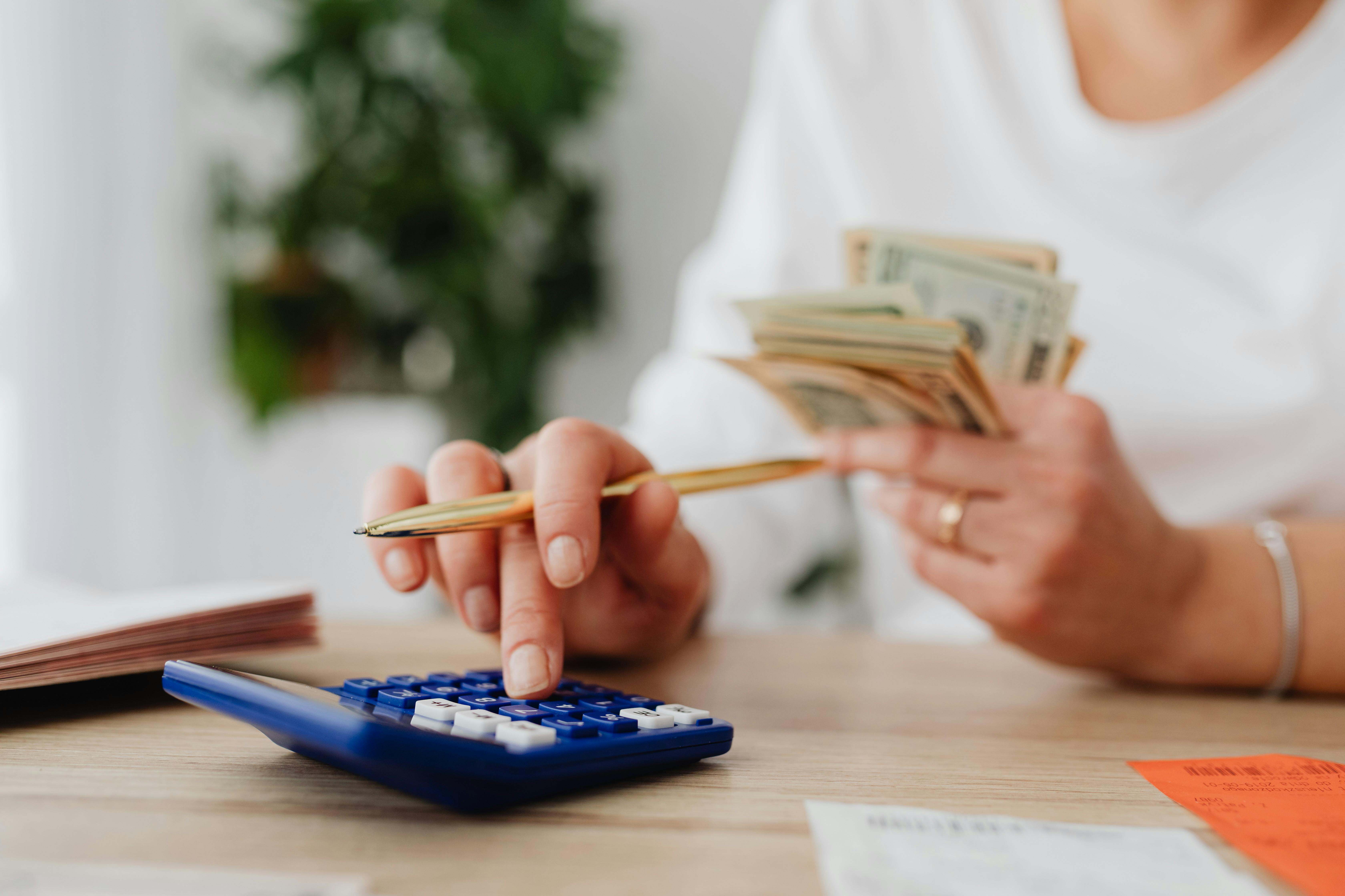 Business owner calculating an equipment financing estimate