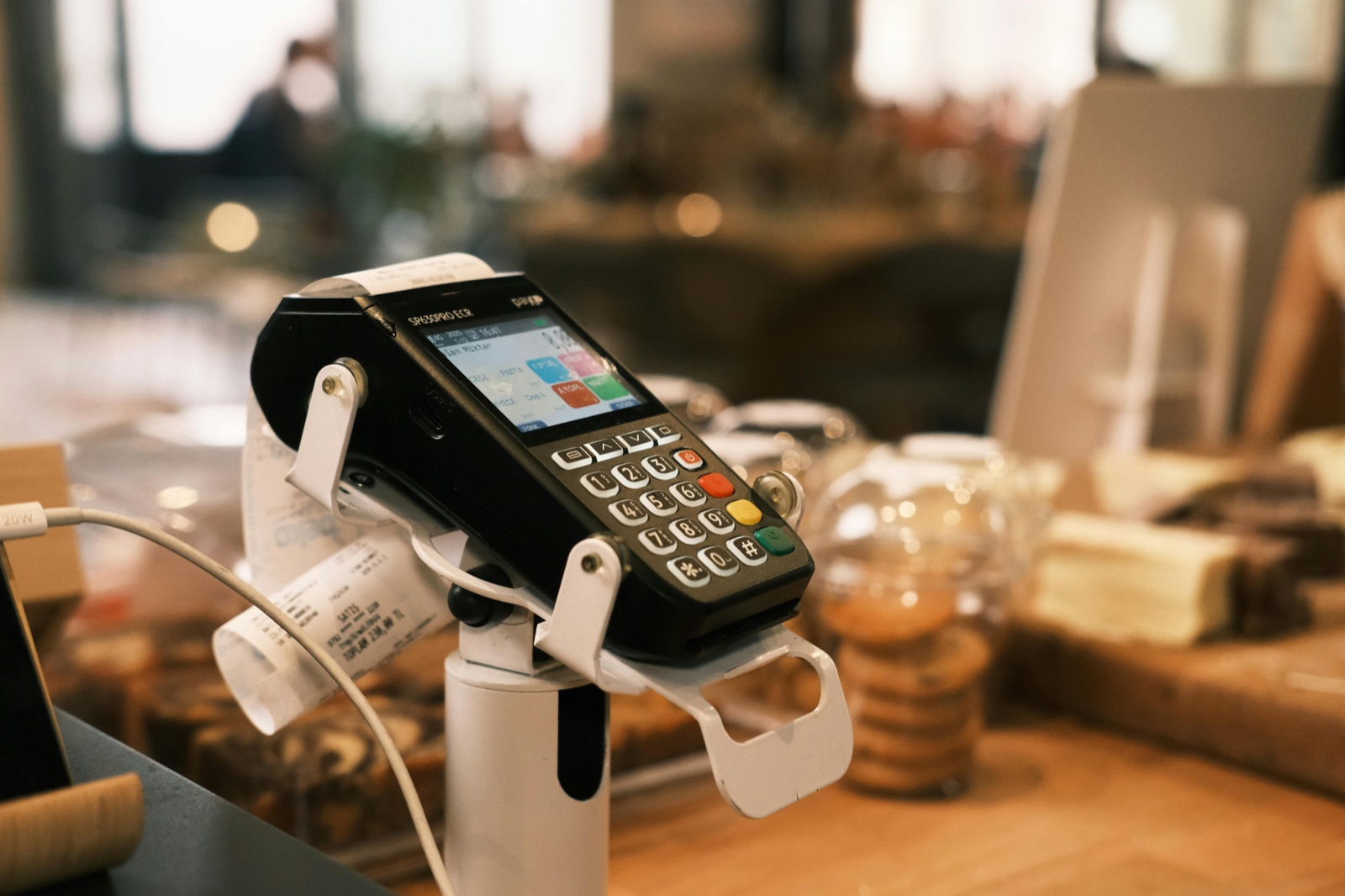 Point-of-sale card reader on a café counter